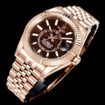 Navigator series men's watch with chocolate dial, rose gold bezel, 42mm case, and rose gold five-link bracelet.